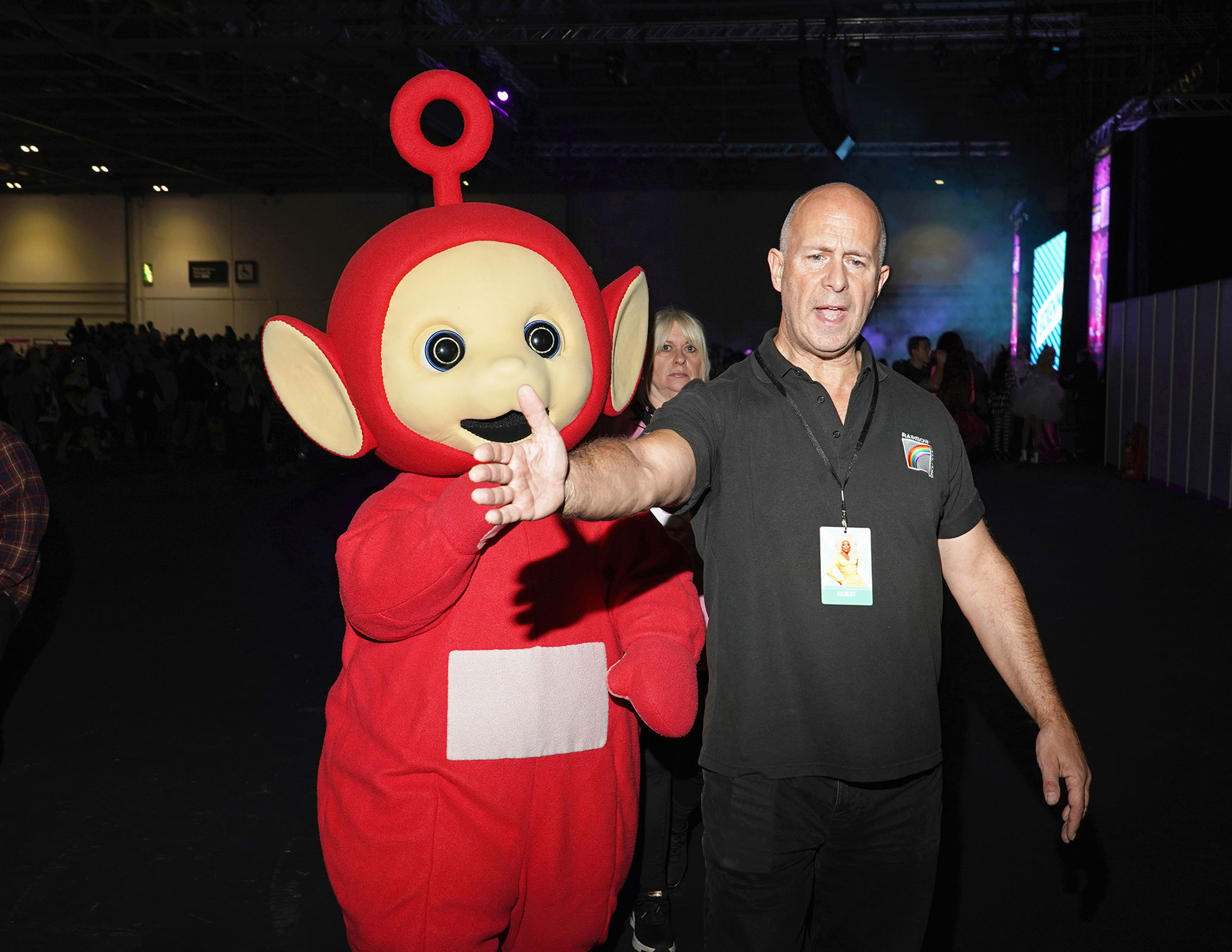 Po, who appeared at several meet and greets during DragCon, is escorted across the event floor by a handler. The Teletubbies was one of the event's main sponsors