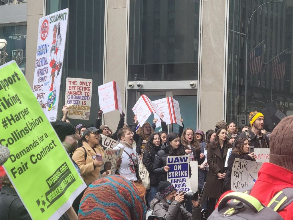 Striking HarperCollins workers rally outside the Manhattan offices of News Corp, the publisher's parent company, on January 18, 2023.