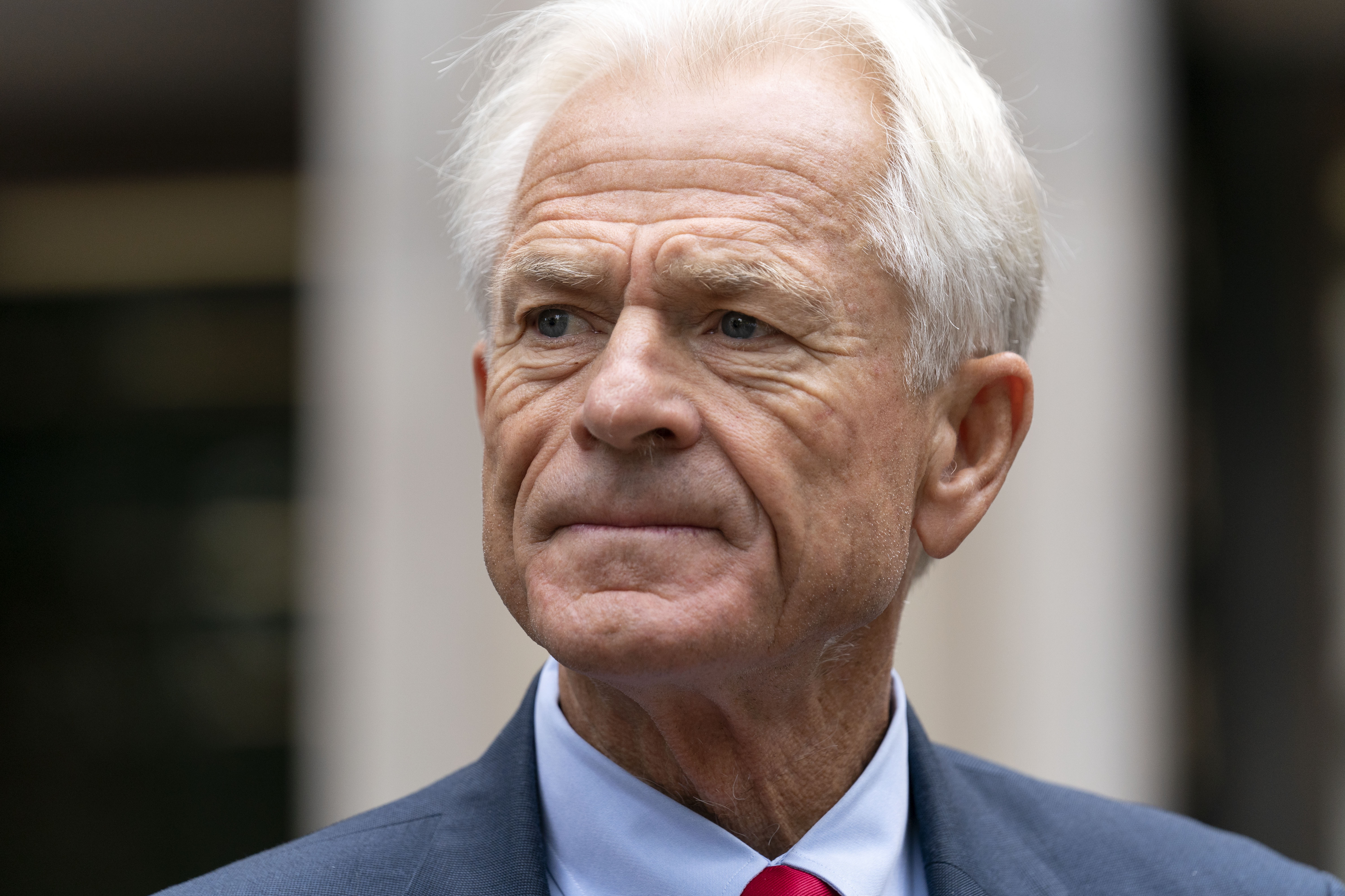 Former Trump White House advisor Peter Navarro speaks to the media as he leaves federal court in Washington, Thursday, Aug. 11, 2022. (AP Photo/Jose Luis Magana)