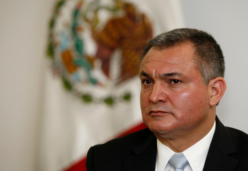 Mexico's Secretary of Public Safety Genaro Garcia Luna attends a press conference on the sidelines of an American Police Community meeting in Mexico City, Oct. 8, 2010.