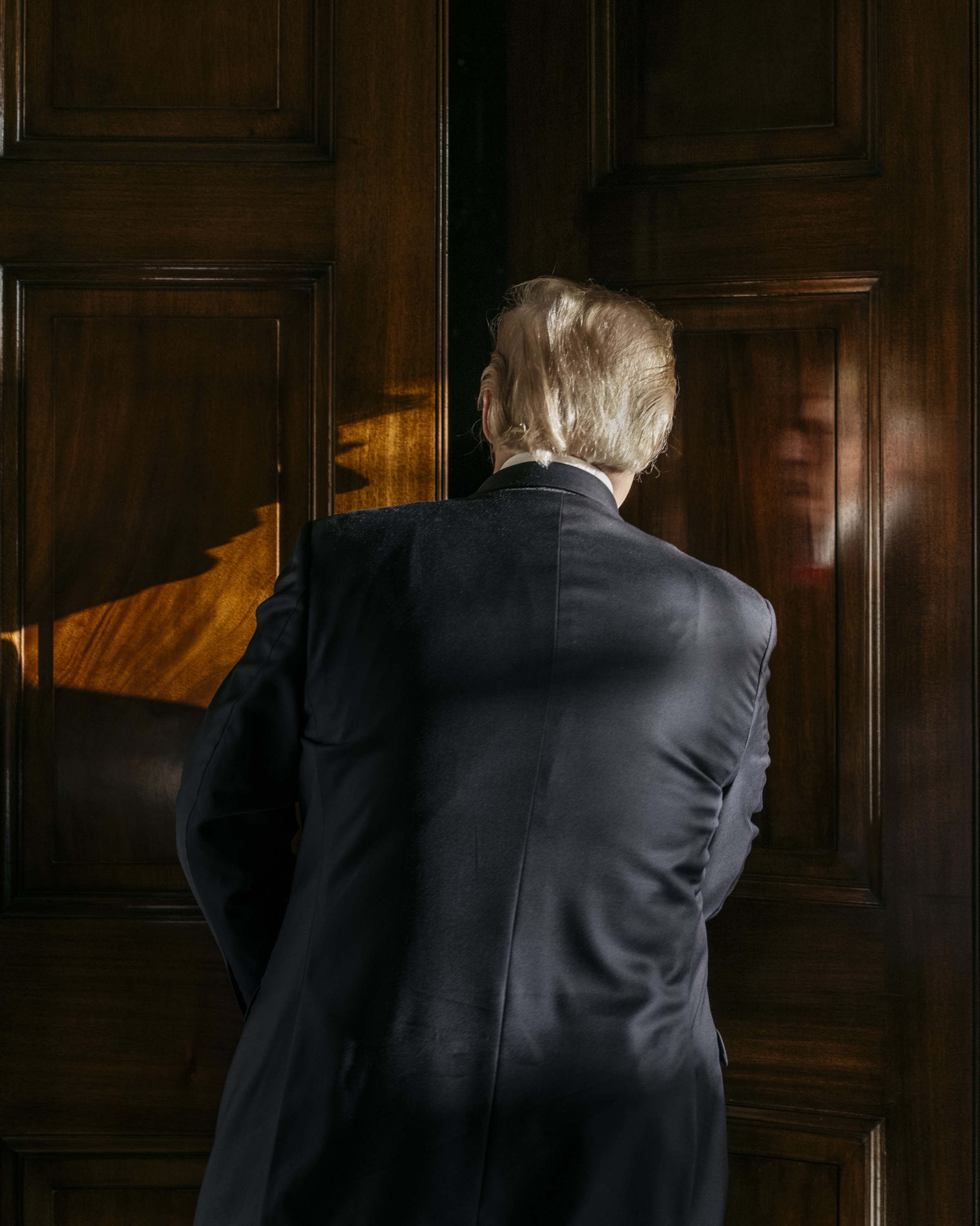 President Donald Trump enters his private living room. White House Executive Residence, Washington, DC © Benjamin Rasmussen