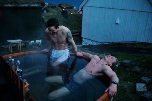 Rogni (26) and Odin (25) in the hot tub at around midnight in Mykines,