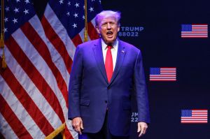 Former US President Donald Trump arrives on stage to speak about education policy at the Adler Theatre in Davenport, Iowa on March 13, 2023.