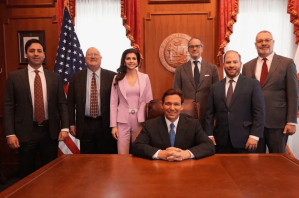 ​Members of the Claremont Institute gather with Florida Gov. Ron Desantis.