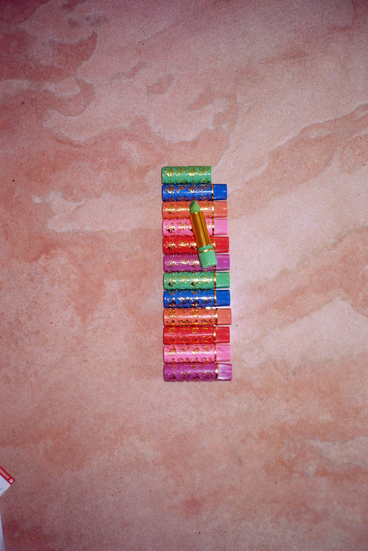 Ramadan photos. Colourful lipsticks on a pink background.