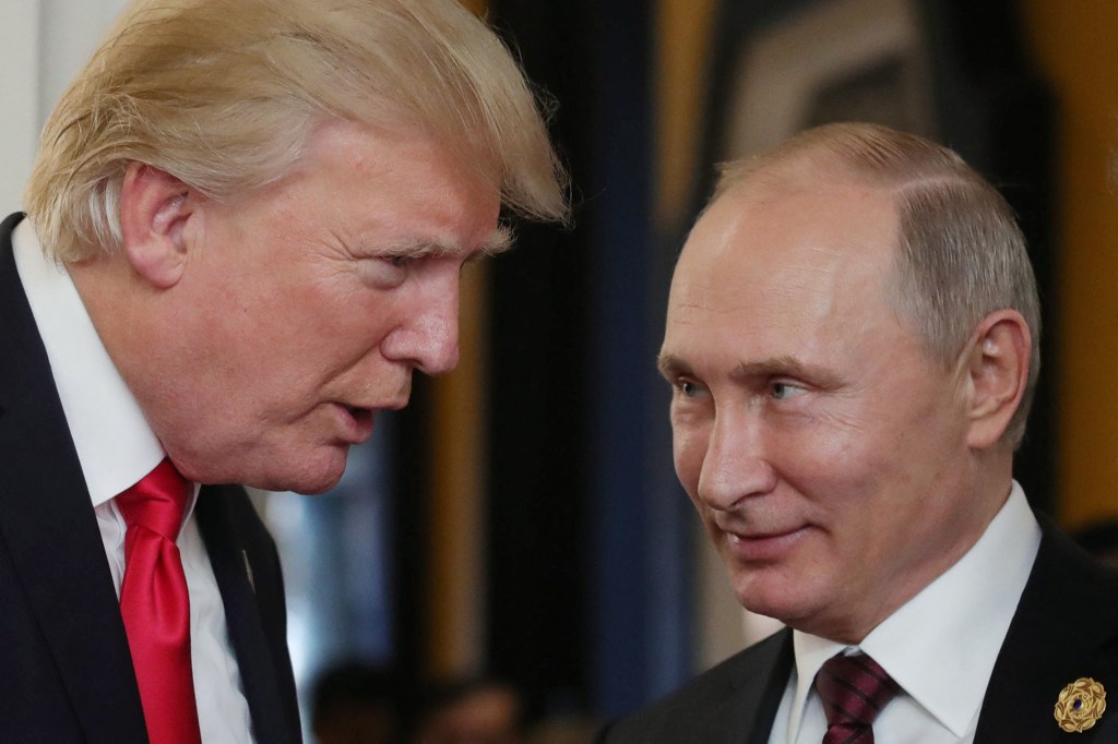 Donald Trump chats with Russia's President Vladimir Putin.