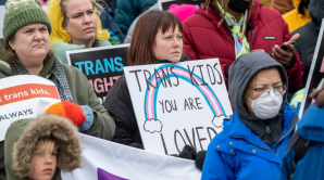 DEMONSTRATORS HOLD A RALLY TO SUPPORT TRANS KIDS IN MINNESOTA, TEXAS, AND AROUND THE COUNTRY.