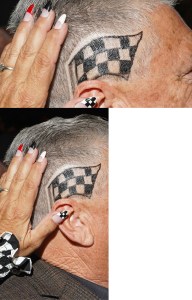 A woman with racing stripe manicure shows a racing stripe face tattoo