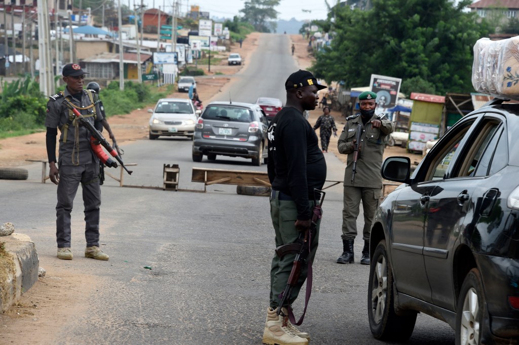 Police officers barricade a road to search vehicles in Osogbo, Osun State.