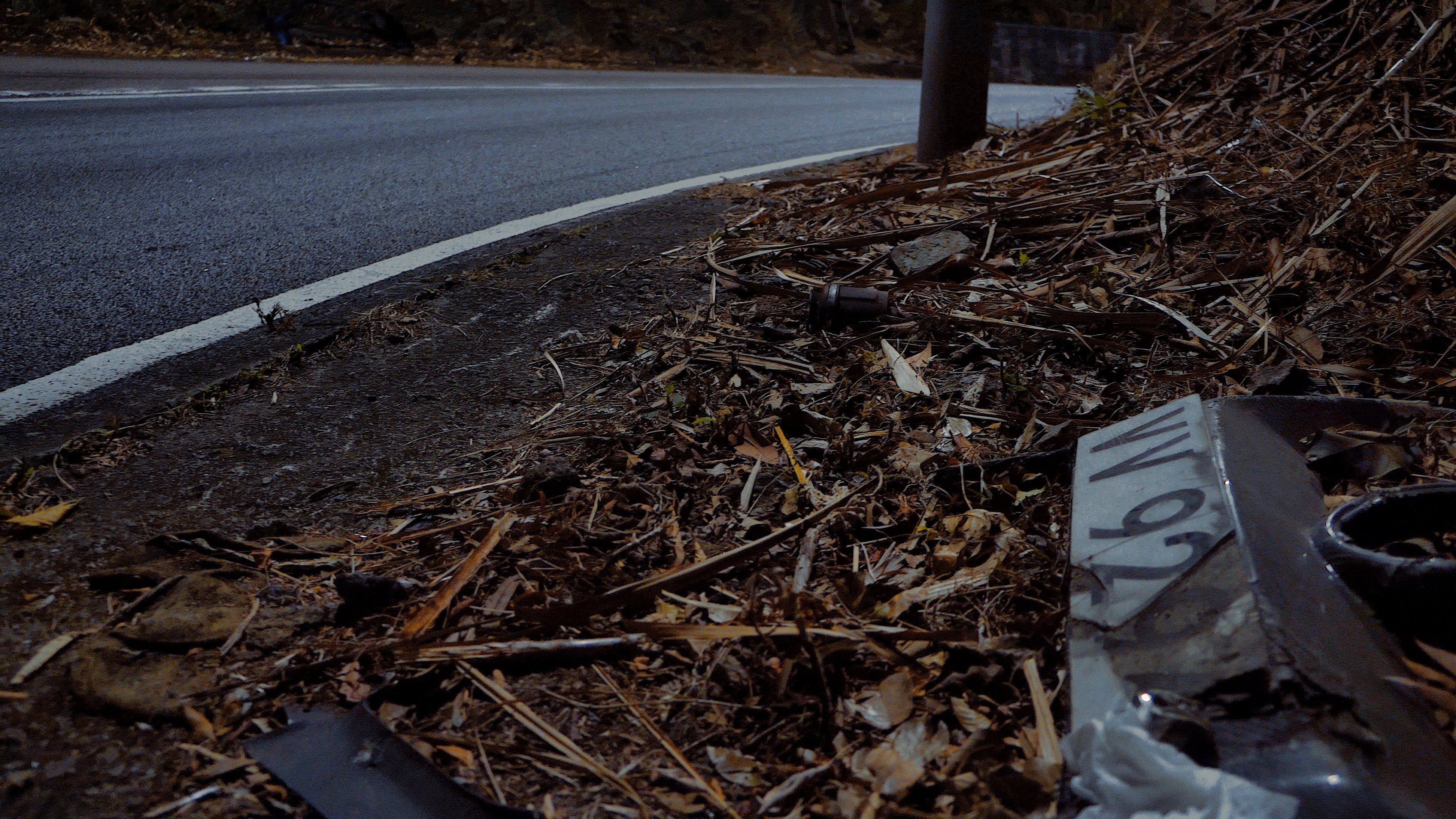 Debris from a previous road incident at Route Twisk, a notoriously tight road for racing. Photo: Mihir Melwani