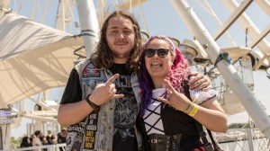 Download Festival 2023: A couple doing rock fingers