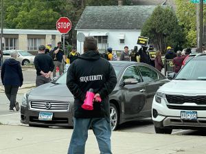 Sequeerity watching Proud Boys protesting.