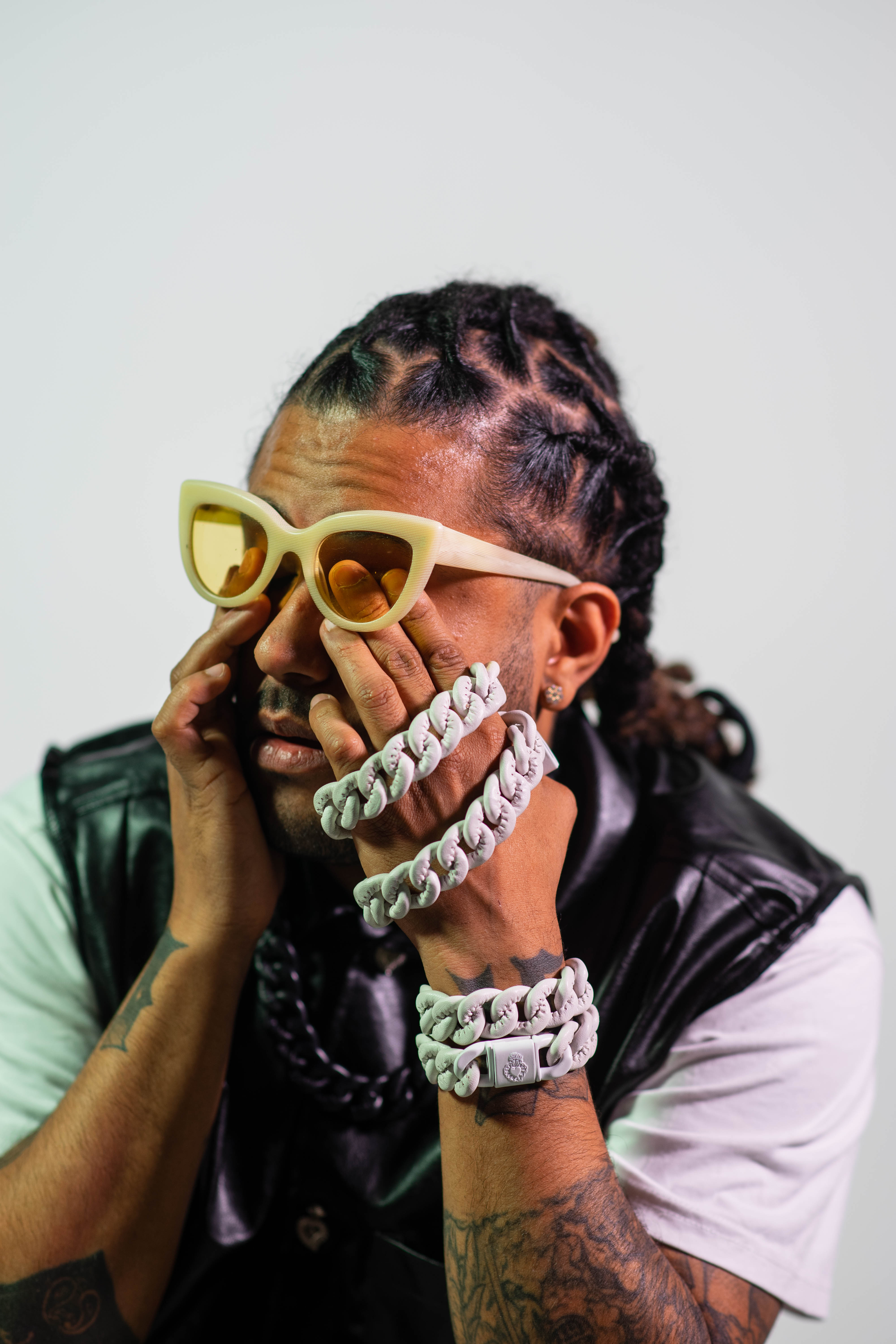 Man wearing Cuban chain bracelet made of leather