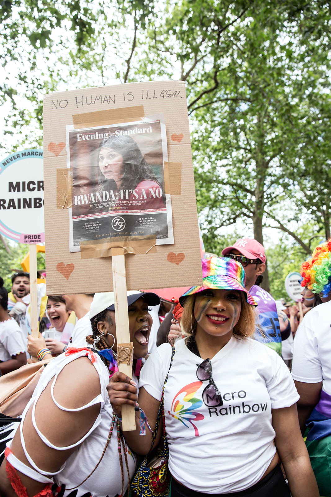 London Pride 2023: Attendees hold up sign reading No Human Is Illegal