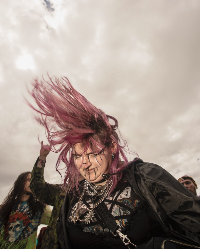 Bloodstock Festival 2023: A pink haired person headbanging to Employed To Serve’s