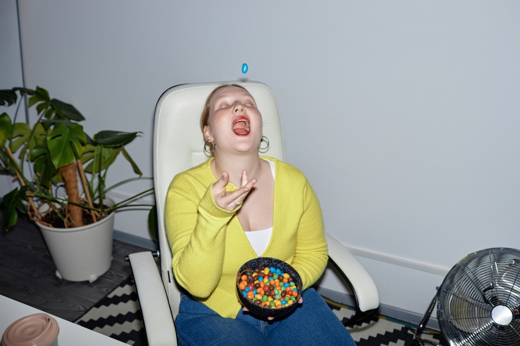 girl eating m&ms