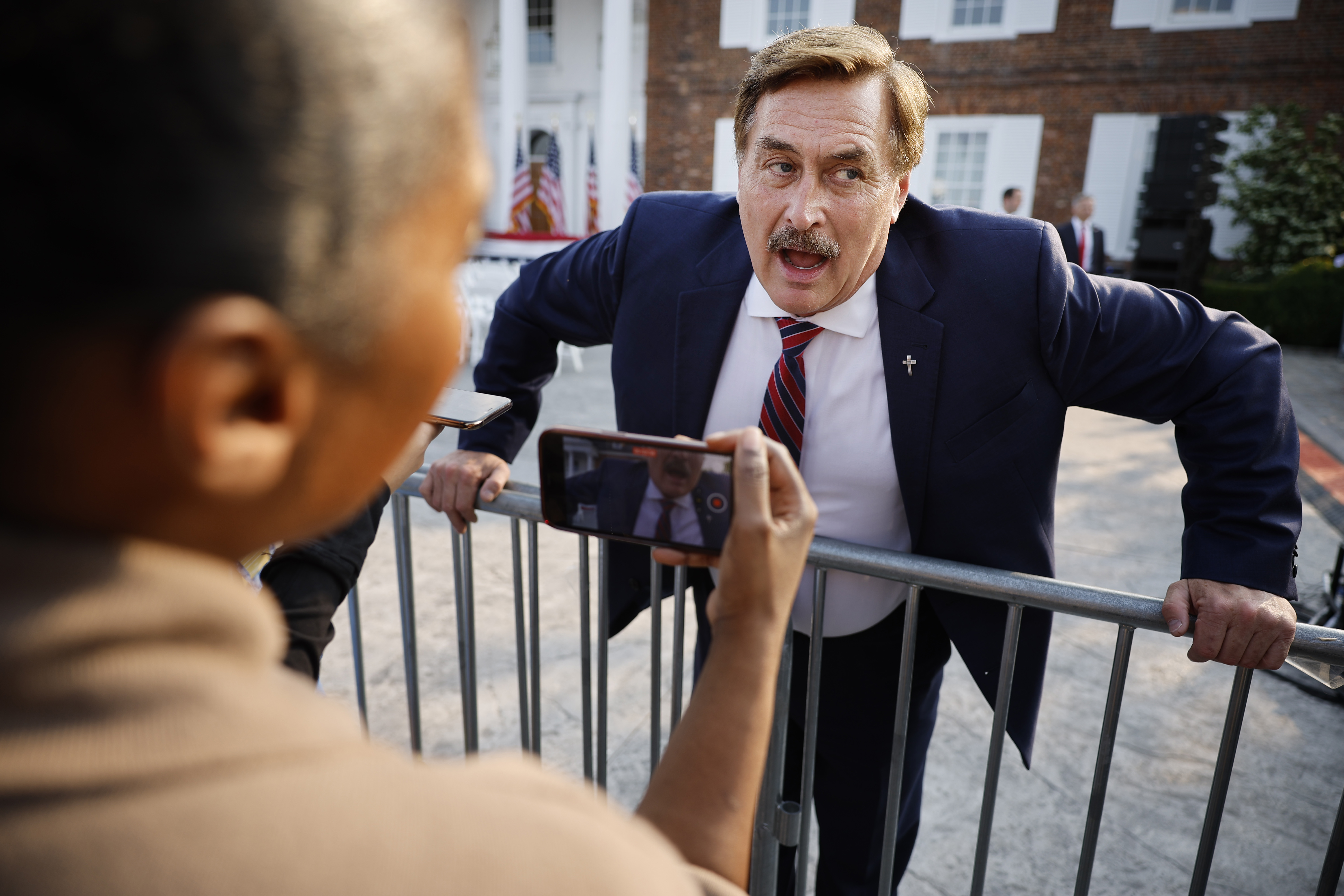 Businessman and election conspiracy theorist Mike Lindell talks with reporters outside the club house at the Trump National Golf Club hours ahead of a speech by former U.S. President Donald Trump on June 13, 2023 in Bedminster, New Jersey. (Chip Somodevilla/Getty Images)