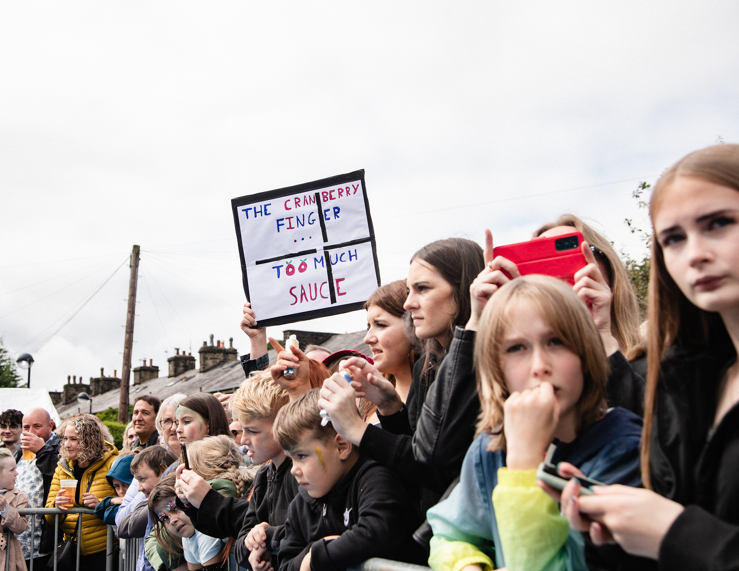 world gravy championships - a photo of the crowd watching people wrestling in a gravy filled wrestling ring.