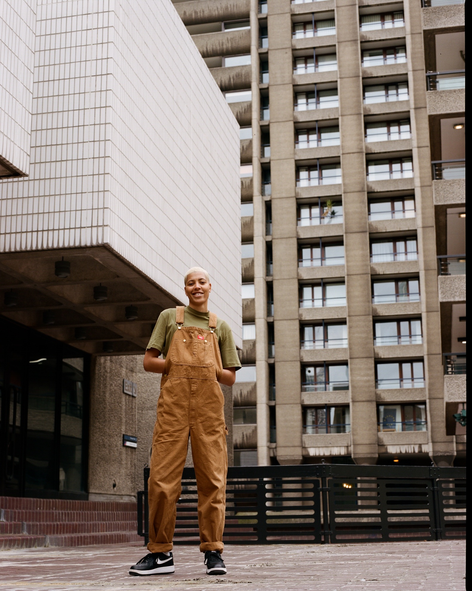 Author Kai Isaiah-Jamal in brown dungarees