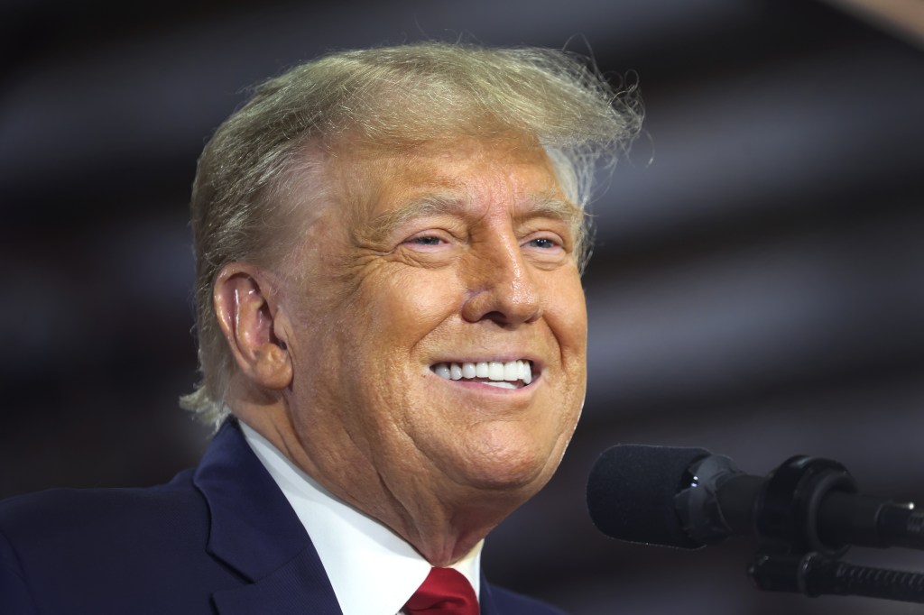 Republican presidential candidate former President Donald Trump speaks to guests during a campaign event at the Dallas County Fairgrounds on October 16, 2023 in Adel, Iowa.  (Photo by Scott Olson/Getty Images)