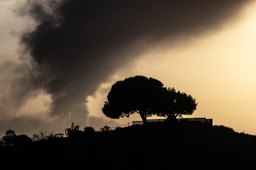 Smoke, rising from damaged area, is seen from the Sderot city after Israeli airstrikes hit the Gaza City on October 26, 2023, in Sderot, Israel. (