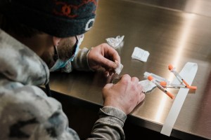 A man utilizes the narcotic consumption booths at a safe injection site at OnPoint NYC on Monday, Jan. 24, 2022 in New York, NY.