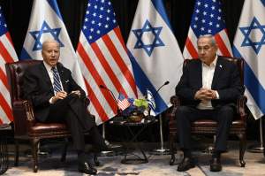 US President Joe Biden (L) listens to Israel's Prime Minister Benjamin Netanyahu as he joins a meeting of the Israeli war cabinet in Tel Aviv on October 18, 2023, amid the ongoing battles between Israel and the Palestinian group Hamas