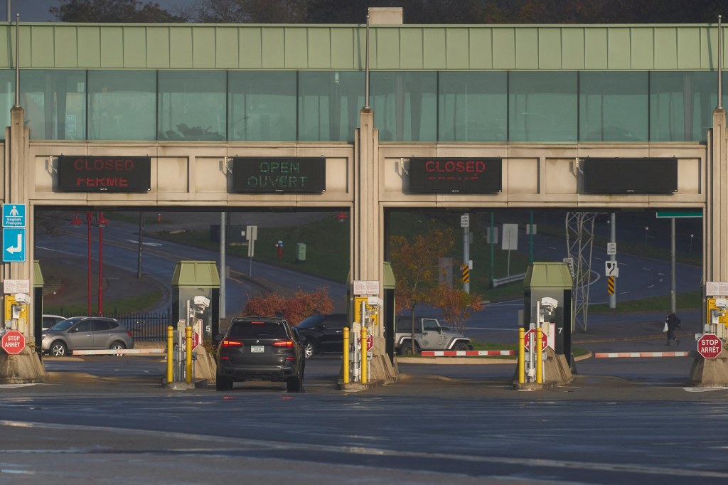 Travellers arrive at the Canadian port of entry on the Rainbow Bridge in Niagara Falls, Ontario on November 8, 2021.