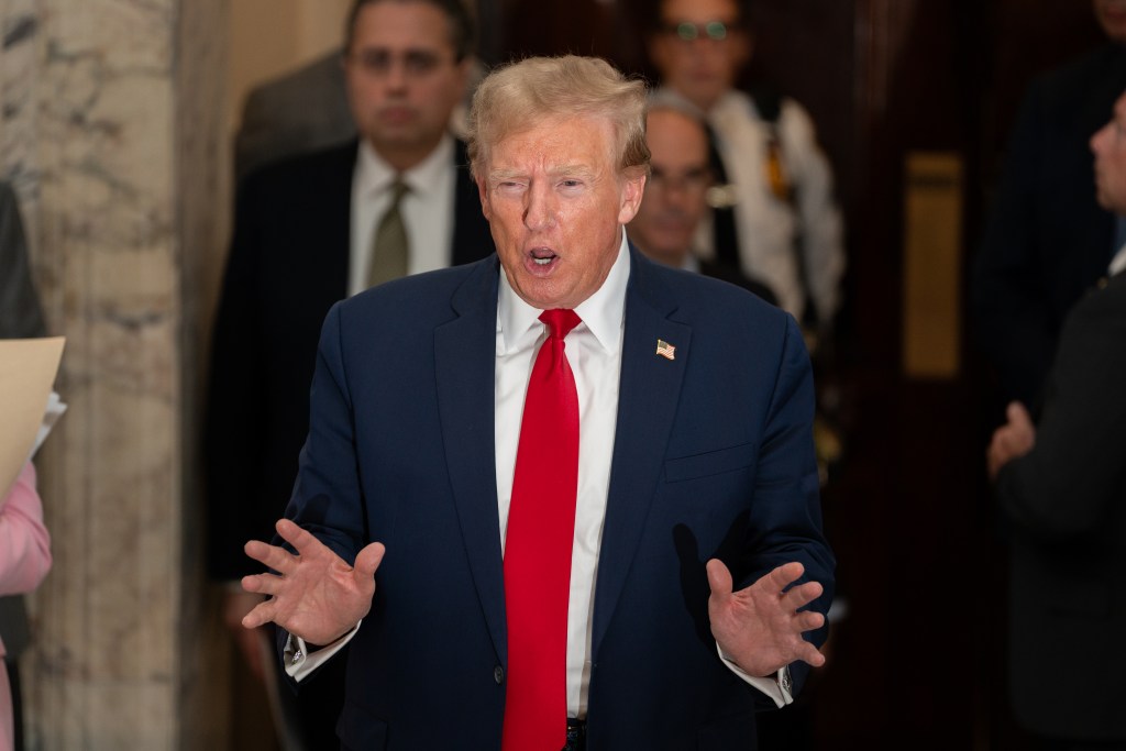 Former U.S. President Donald Trump departs for lunch and speaks to the media during his trial in New York State Supreme Court on December 7, 2023 in New York City.