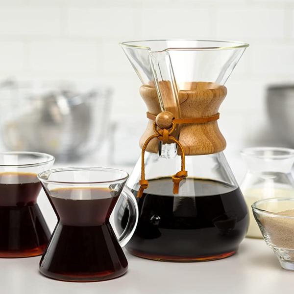 A glass carafe filled with coffee.