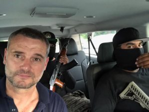 Professor Bertrand Monnet in car with Mexican cartel members