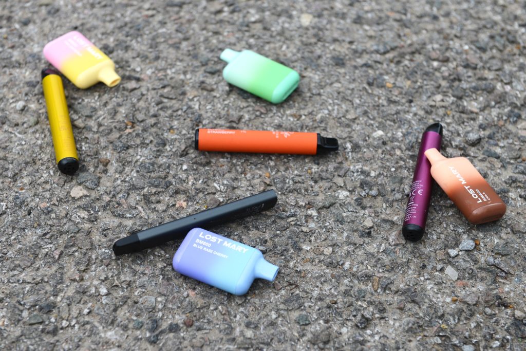 discarded used vapes littering a parking lot. Photo by 	Peter Dazeley / Contributor v