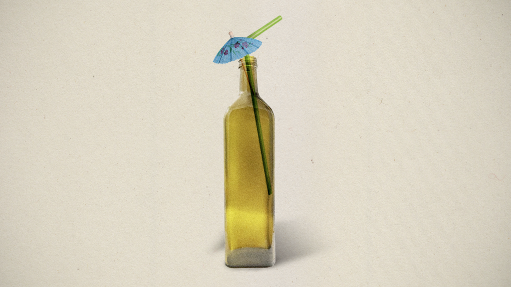 olive oil oil-washed cocktail with an umbrella in the bottole