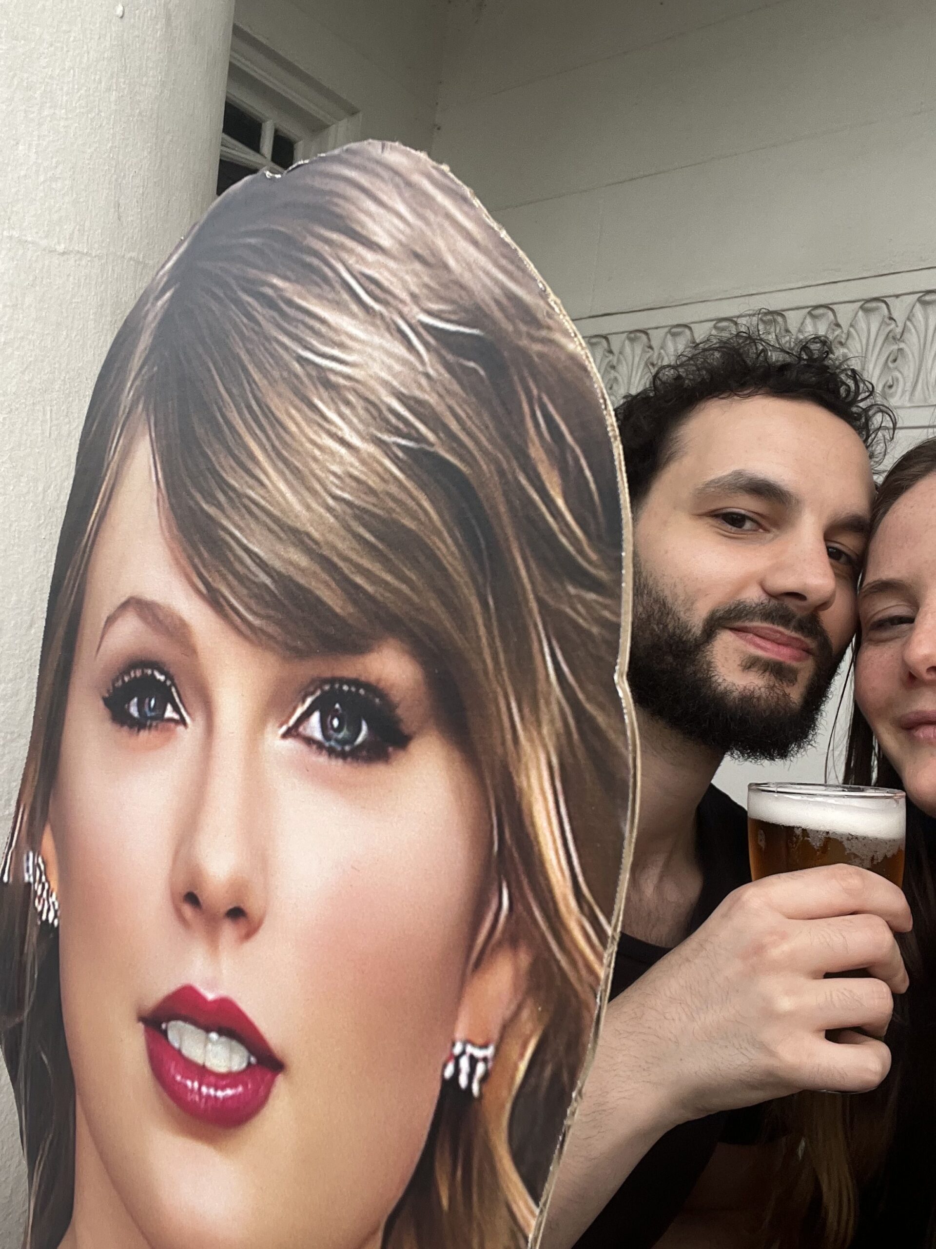 Standing behind a life-save Taylor Swift cut-out