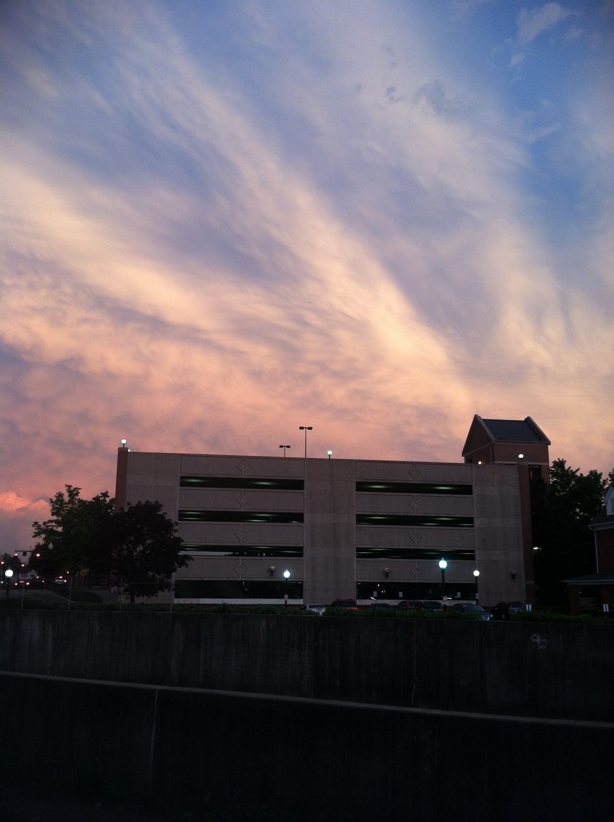 A picture of a building at sunset.