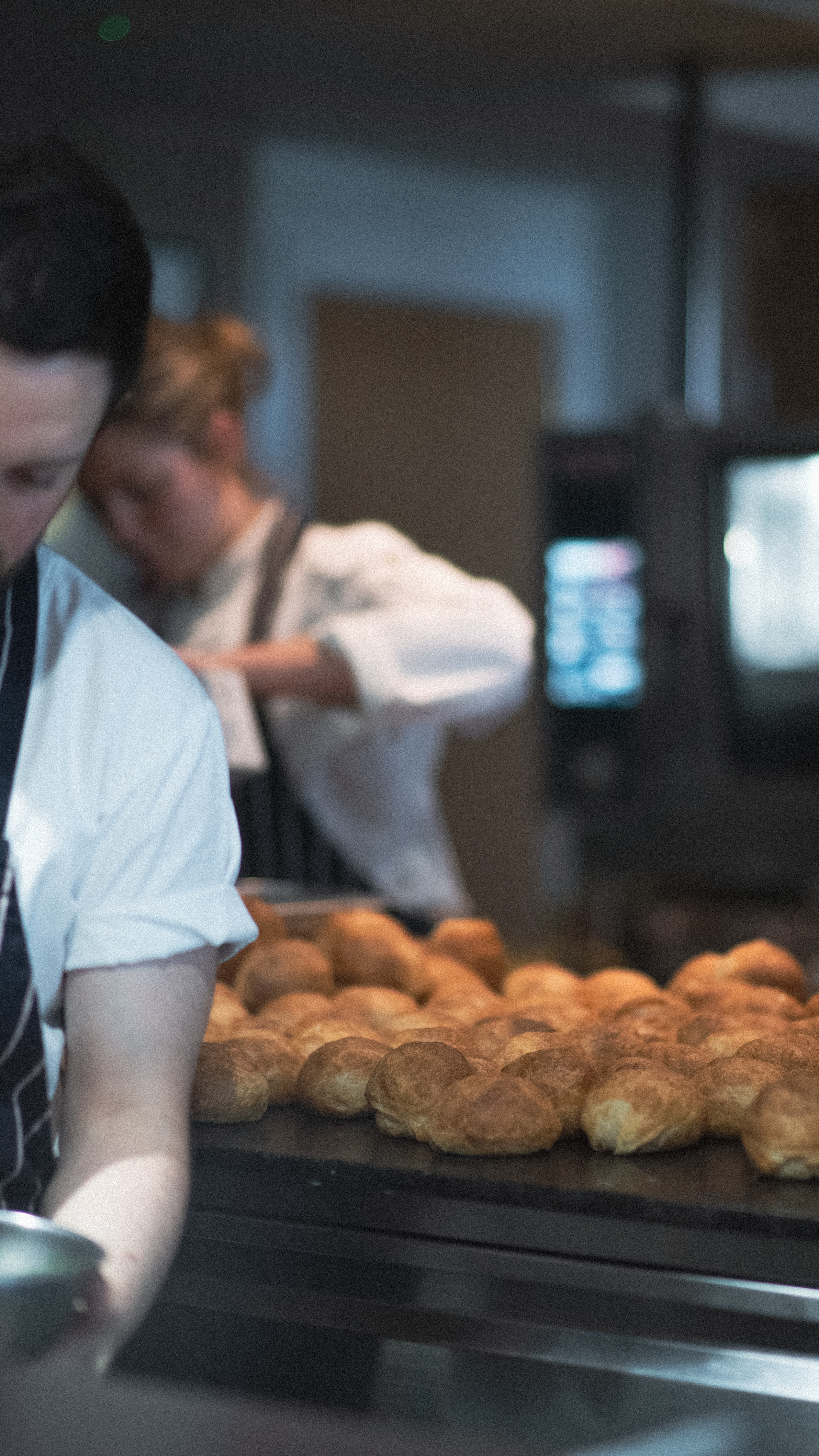 Bread and chefs in a restaurant in Clapham, south-west London.