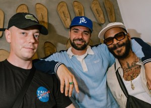 Three food influencers pose for a photo