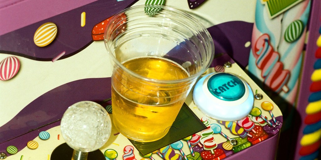 beer on an arcade machine