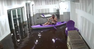 florida man kayak flooded house