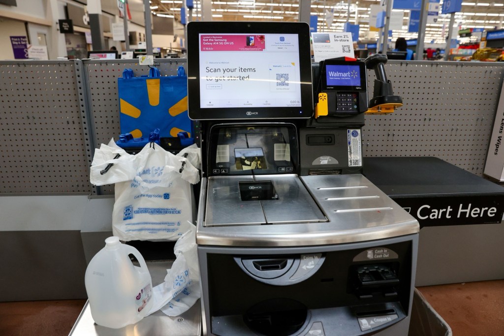 Walmart self checkout counter Photo by ADAM DAVIS/EPA-EFE/Shutterstock