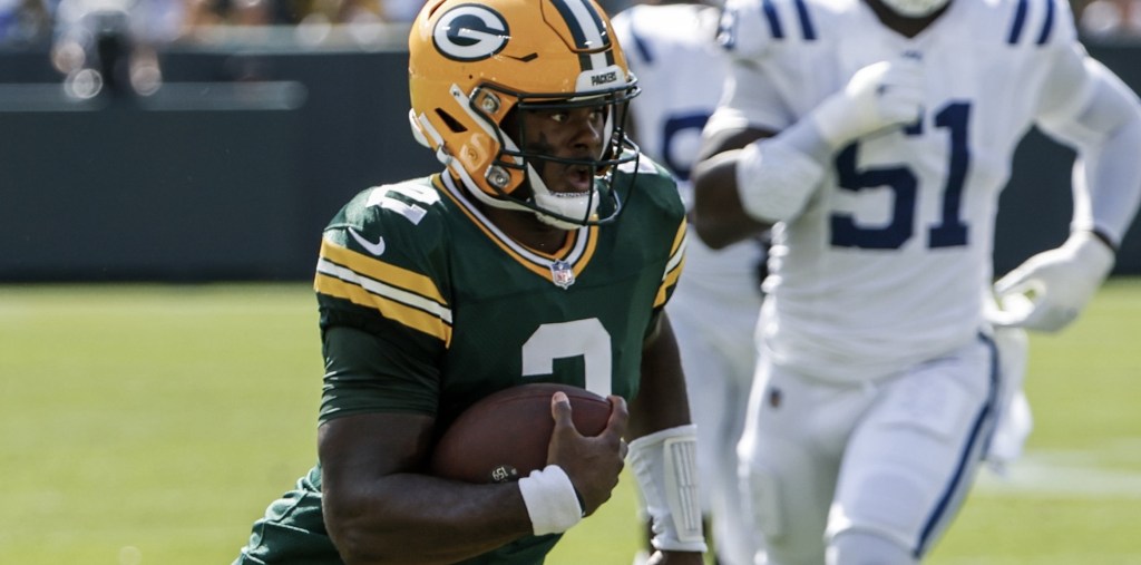 Green Bay Packers quarterback Malik Willis scrambles with the ball. Photo by Tannen Maury/UPI/Shutterstock.