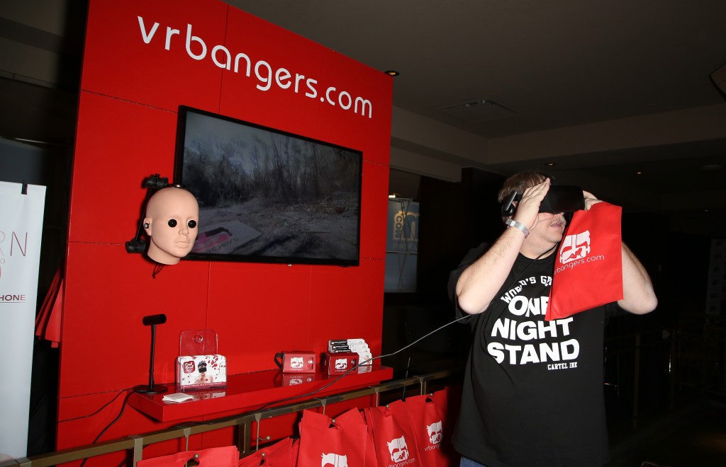 AN ATTENDEE TRIES A VR PORN HEADSET AT THE 2017 AVN ADULT ENTERTAINMENT EXPO IN LAS VEGAS. (PHOTO: GABE GINSBERG/FILMMAGIC)