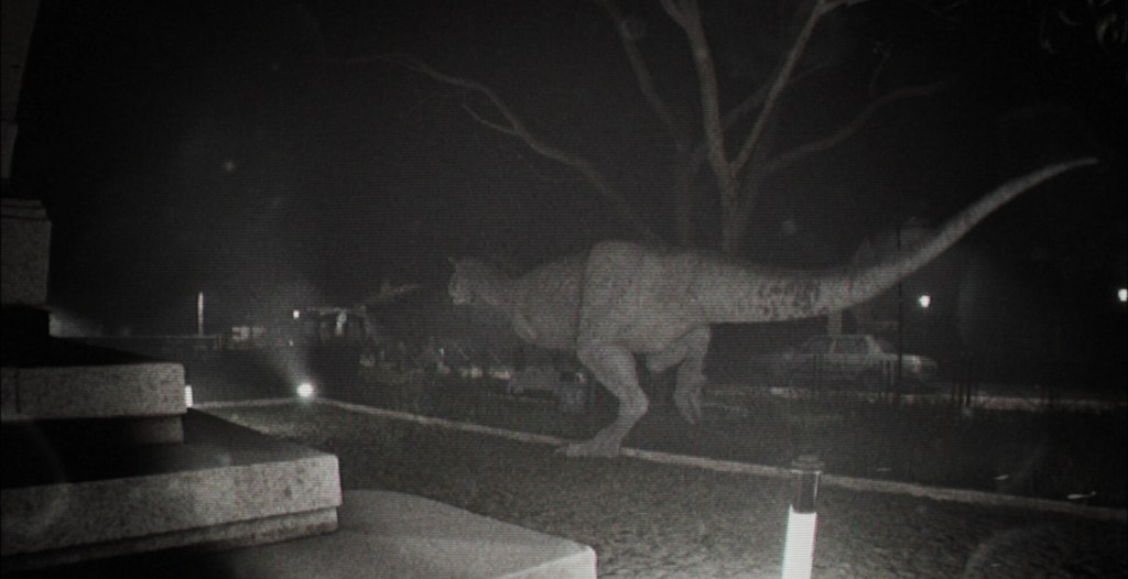 A dinosaur roaming the streets in Unknown Tapes